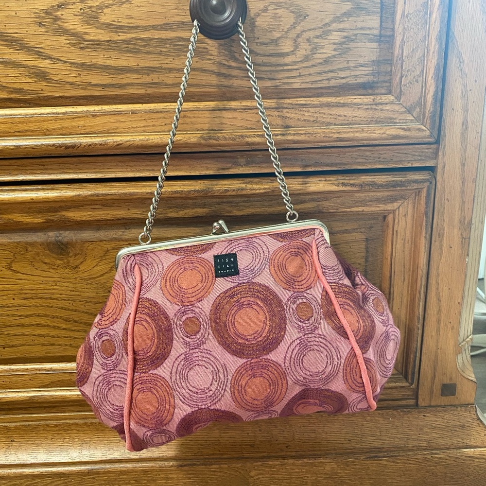 1154 lill studio pink clutch